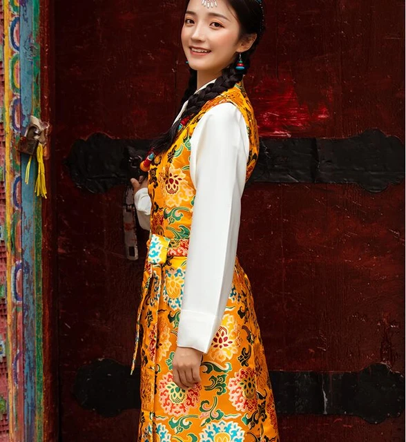 A lady in traditional Tibetan dress. | Like to see the pictu… | Flickr