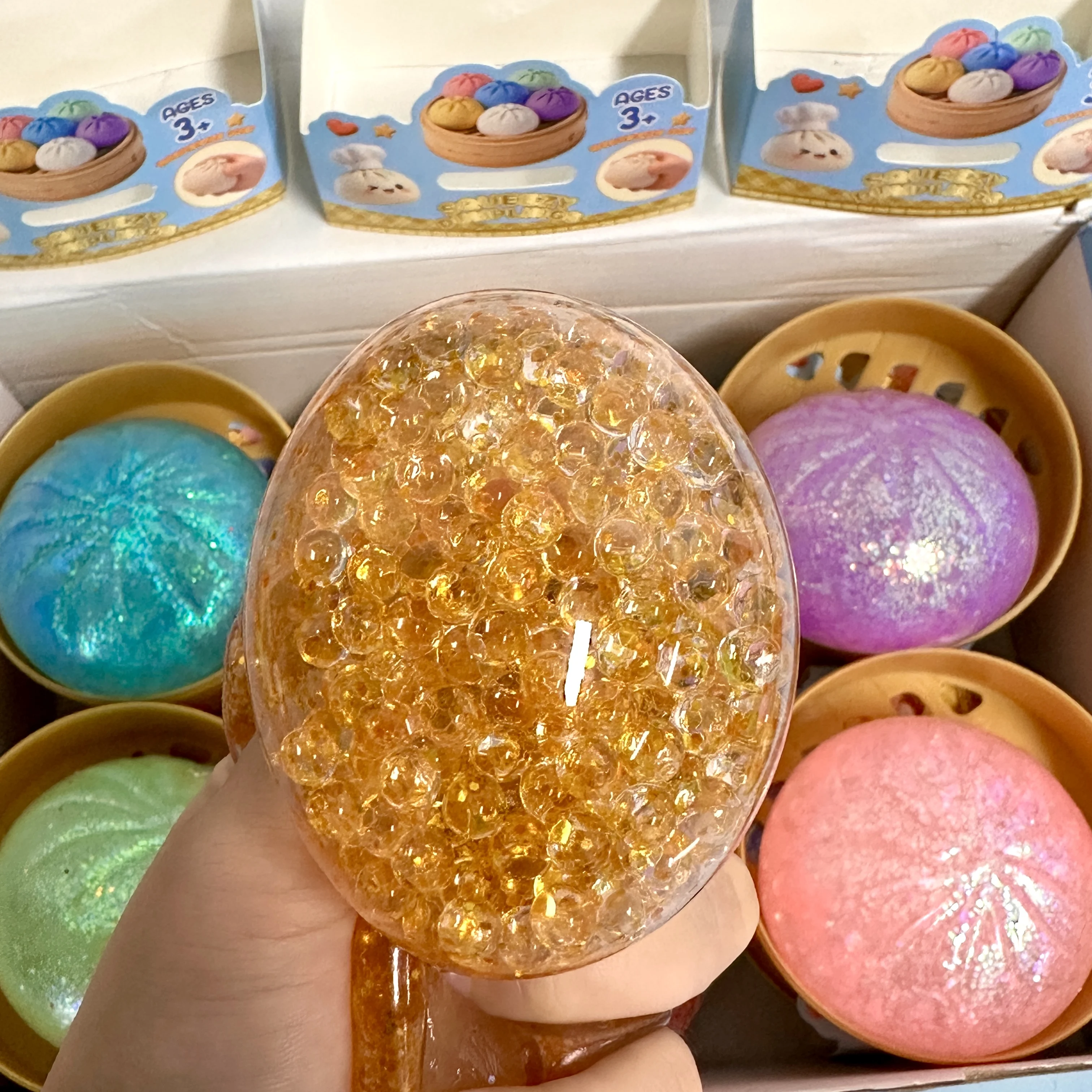Glitter Dumpling Squishy Toy with Steamer Box - Stress & Anxiety Relief
