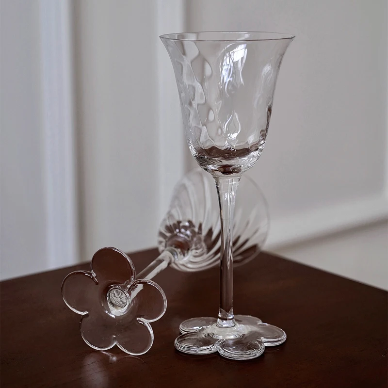 https://ae01.alicdn.com/kf/Sb8bd5ad97d47421cbd3c3137393d0dfdZ/JINYOUJIA-Exquisite-Rotational-Stripe-Flower-Base-Transparent-Goblet-Cup-Household-Champagne-Red-Wine-Glass-Design-Sense.jpg