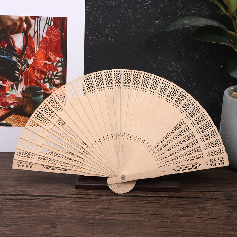 

1pc Fashion Fragrant Wood Fan Cheongsam Folding Fan Chinese Wooden Fan Vintage Hollow Antiquity Folding Fan Dance Wedding Gifts