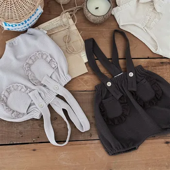 Nuovo arrivo neonate coreane in generale bambino carino tinta unita cinturino in pizzo pantaloncini neonate semplicità grandi pantaloni in PP 1