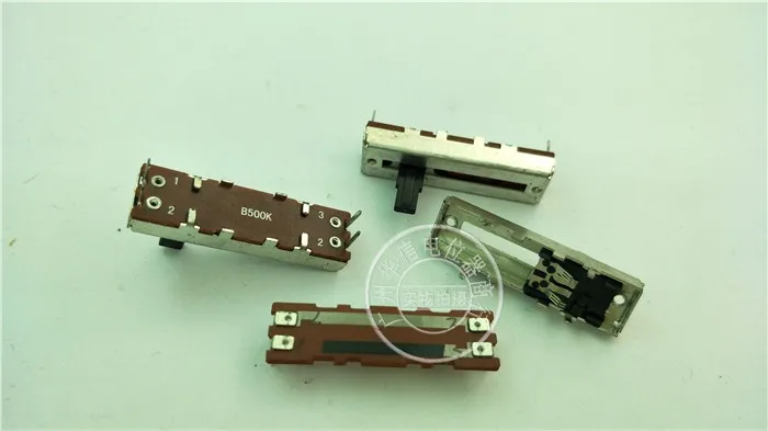 

SL-2042N 3.5 cm single flipper potentiometer B500k black handle 10MM white shell 4 feet non-standard