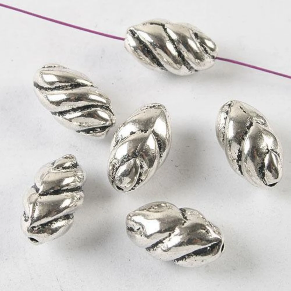 

10PCS 12x7mm DARK SILVER TONE 12MM LONG SPACER BEADS H3696