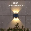XFLAMPER Warm White 4LED Solar Lights Outdoor for Garden Up and Down IP65 Waterproof Wall Lamps for Home Yard Decoration (2PCS) 3