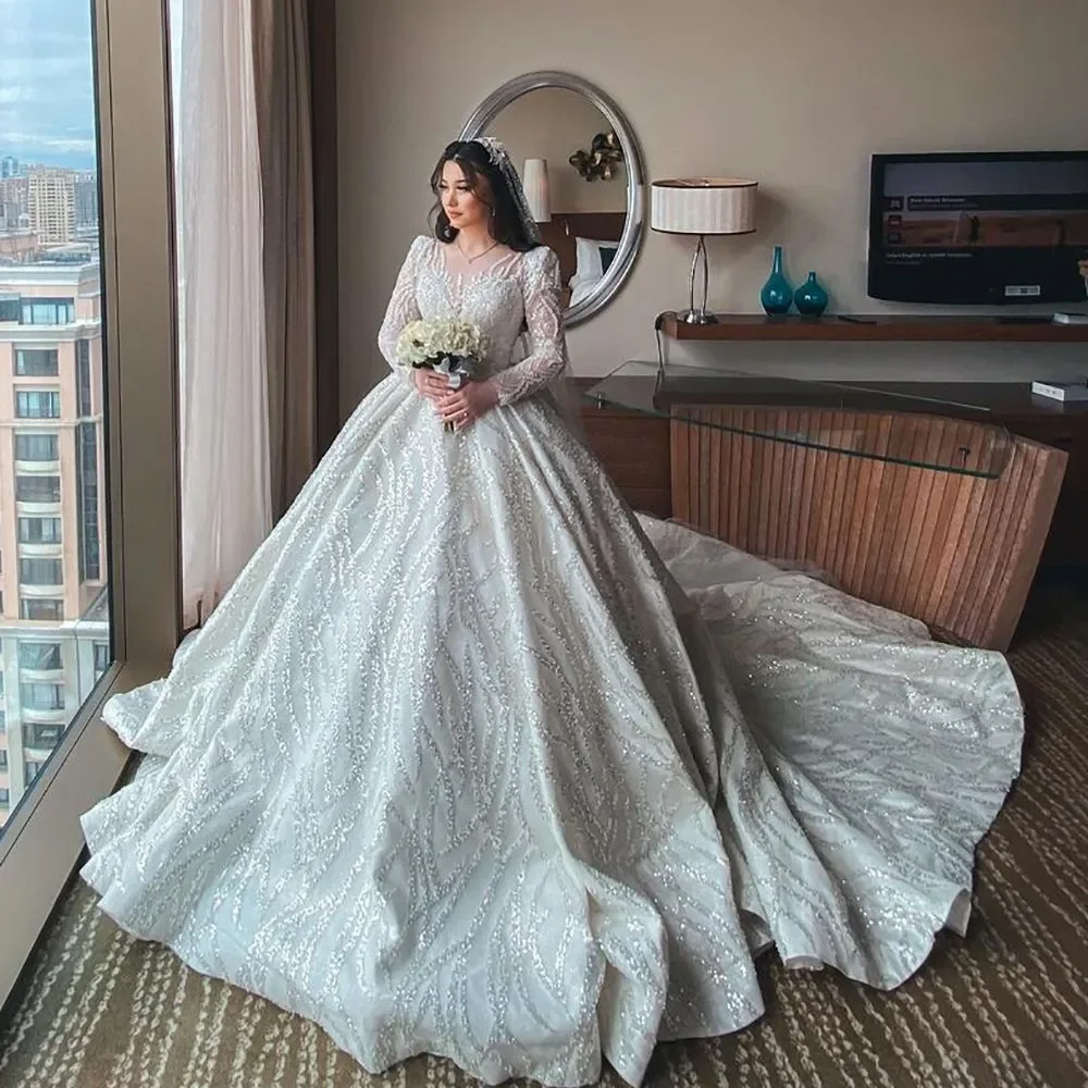 

Luxurious White Ladies Wedding Ball Dress With Sequin Long Sleeve Crystal Sparkling Beaded O-Neck Long Train Dubai Bridal Gown