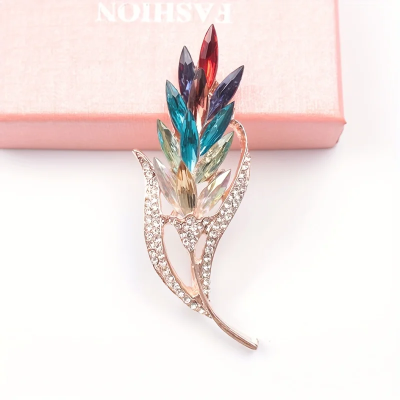 Spilla a forma di uva in oro 14 kt: spilla a forma di vite in granato rosso - Italia