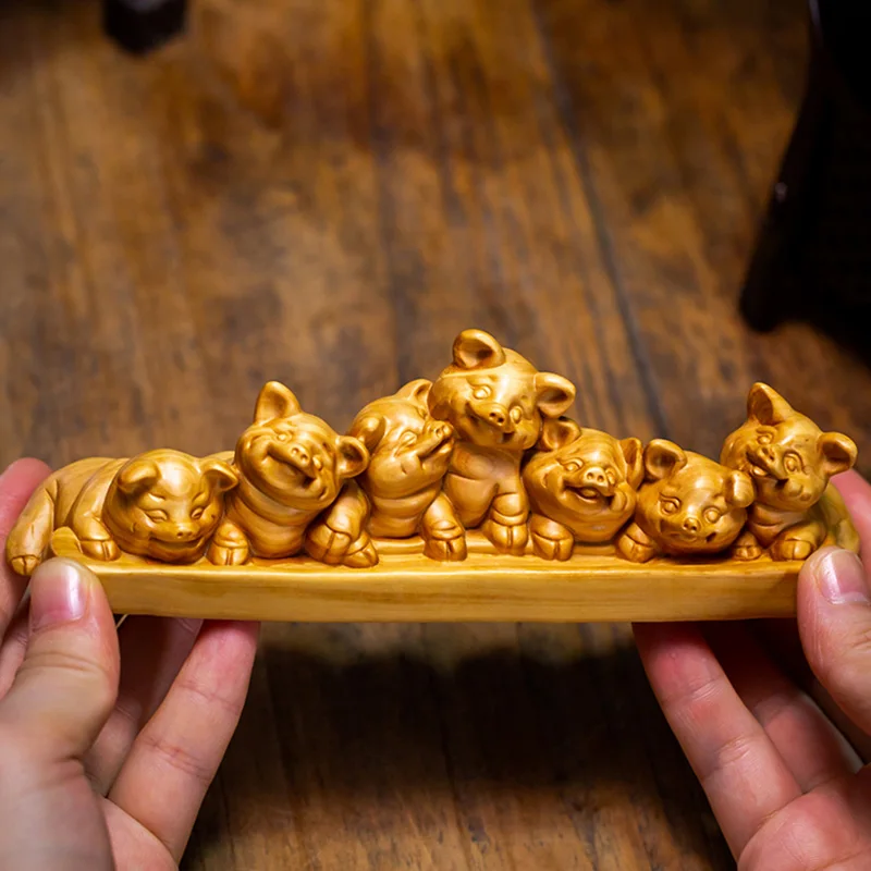 

Chinese Lucky Pig Family Solid Wood Sculpture for Home & New Year Decor