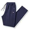 Men Fitness Sportswear Autumn Pants Tracksuit Elastic Waist Sweatpants Cotton Trousers Loose Gyms Jogger Track Pants Mens M- 8XL 1
