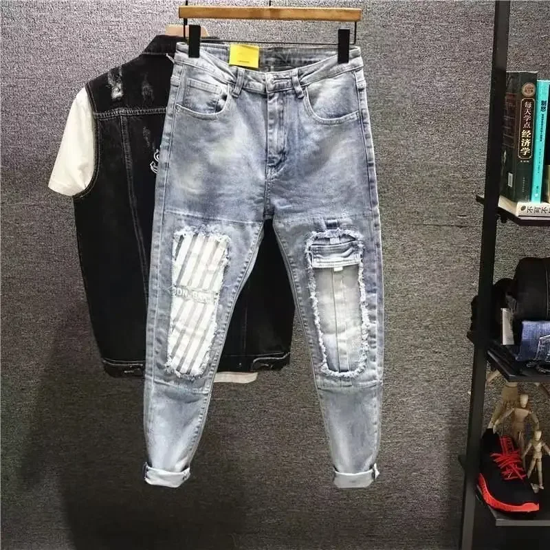 thumbnail image 1 of Pantalones harén de color azul claro con agujeros, pantalones vaqueros masculinos rotos, rotos, recortados, vaqueros rasgados para hombres, nuevos en otoño de 2024, coreanos, baratos, 1 of 4