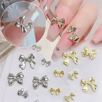 10pcs/Bag Metal 3D Bowknot Grey Gold Jewelry Nail Art Decorations Studs Charms Rhinestones Manicure Decorate For DIY Women 1