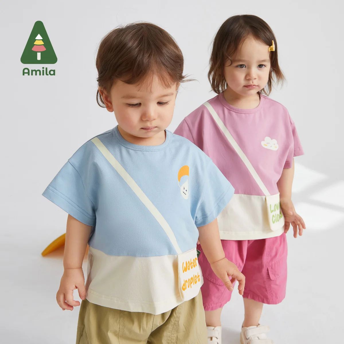 

Amila Baby Short Sleeve T-shirt 2023 Summer New Cute Stitching Fun Pocket Casual Simple Large Cuff Top for Boys and Girls 0-6Y