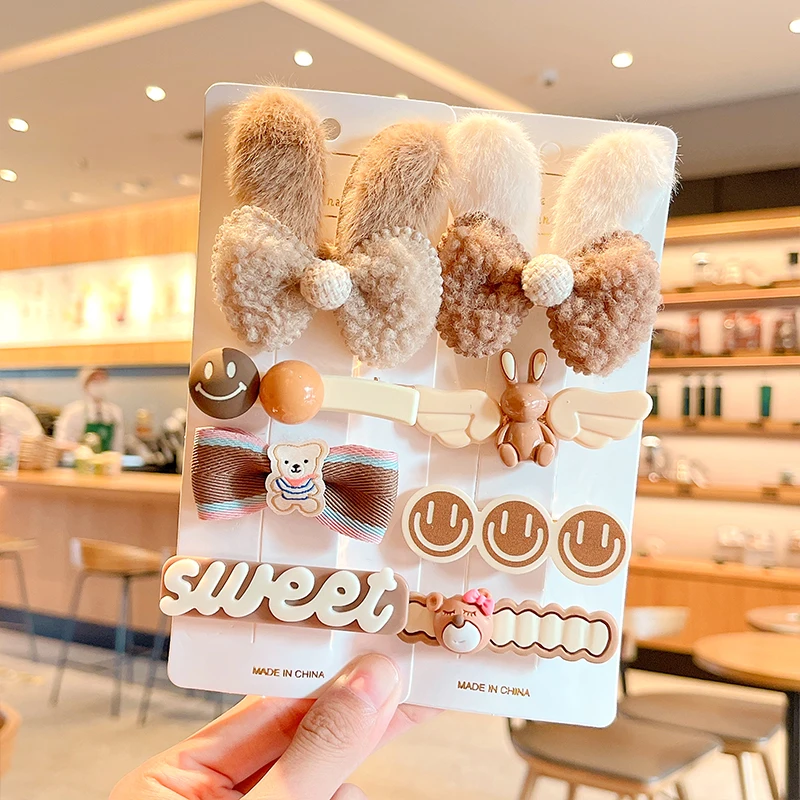 https://ae01.alicdn.com/kf/Sb9240d8c9b224fa7b150ae9023f509b8y/4-8-Pcs-Set-Children-Cute-Coffee-Color-Plush-Cartoon-Flower-Bow-Ornament-Hair-Clips-Girls.jpg