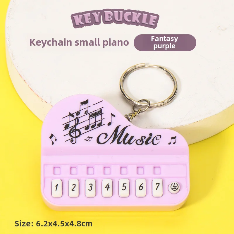 Llavero luminoso creativo de juguete para niños, miniconsola de videojuegos con teclado digital y reproductor de música