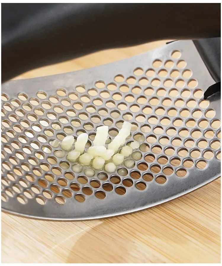 &middot; Free returns within 90 days, no questions asked Stainless Steel Garlic Press Crusher Manual Garlic Mincer Chopping Too