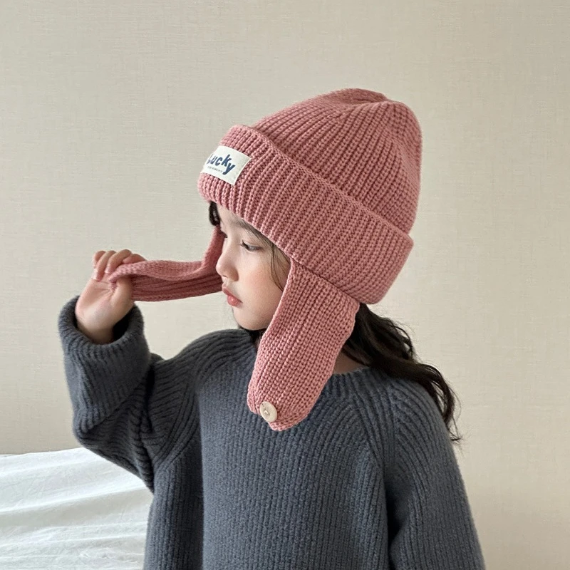 Рисунок 5 - Осенне-зимние детские шапки вязаные