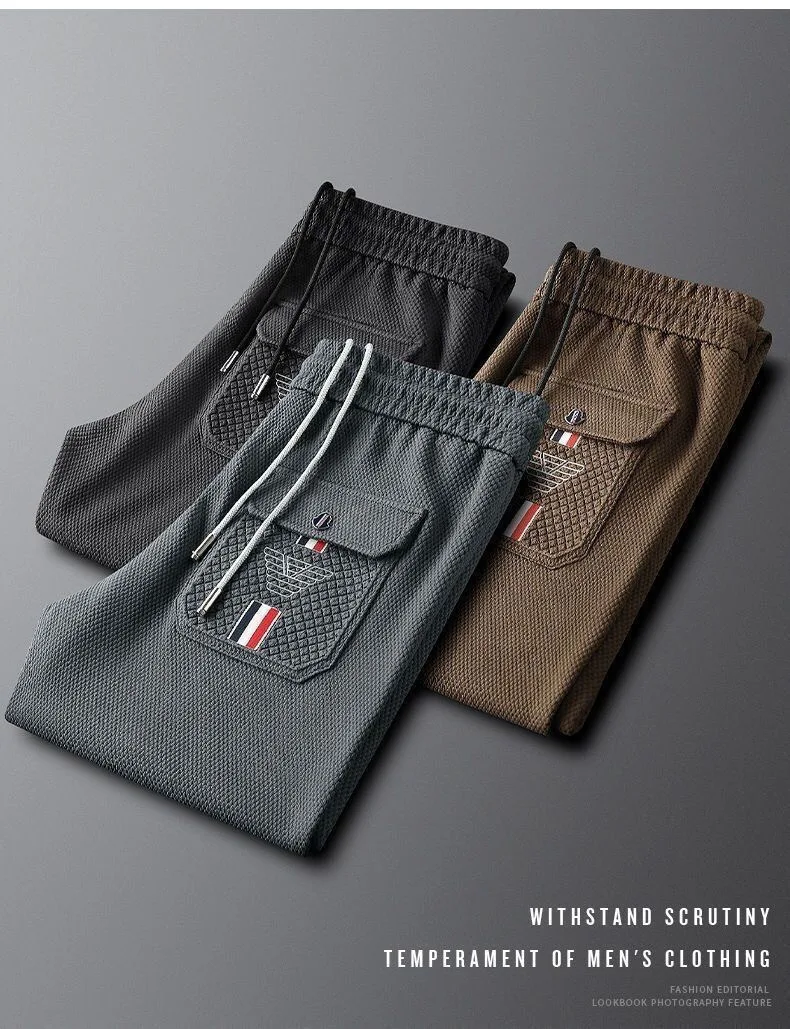 Description Picture 2 of itemEuropean luxury brand casual pants men spring New high end waffle elastic waistband with drawstring pocket embossed sports pants
