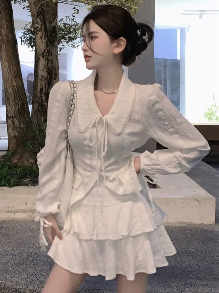 

Женский комплект из 2 предметов, рубашка с отложным воротником и длинным рукавом, на шнуровке, облегающая многослойная мини-юбка с оборками, модная одежда в Корейском стиле на осень