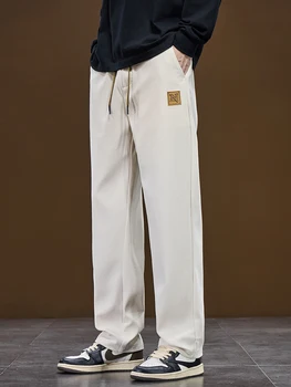 Pantaloni larghi a gamba larga da uomo nuovi autunnali Tessuto di velluto a coste Bianco Nero Moda Pantaloni dritti larghi coreani Pantaloni sportivi da esterno 1