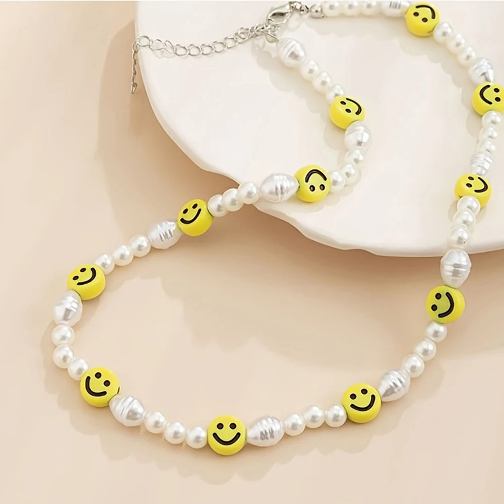 Set di gioielli con volto sorridente di perle - Dettaglio perle