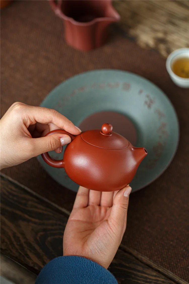 Description Picture 6 of item240ML Yixing Purple Clay Teapot Machine-made Xishi Tea Pot Raw Ore Dahongpao Quality Teaware Oolong Pu're Tea Set Filter Kettle