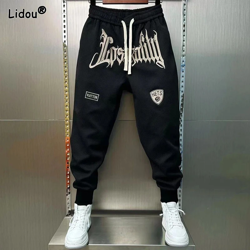 2024 Spring and Autumn Men's Loose Elastic Lace Up Embroidered Feet Pocket Casual Fashion Elegant Commuter Pants Harlan Pants