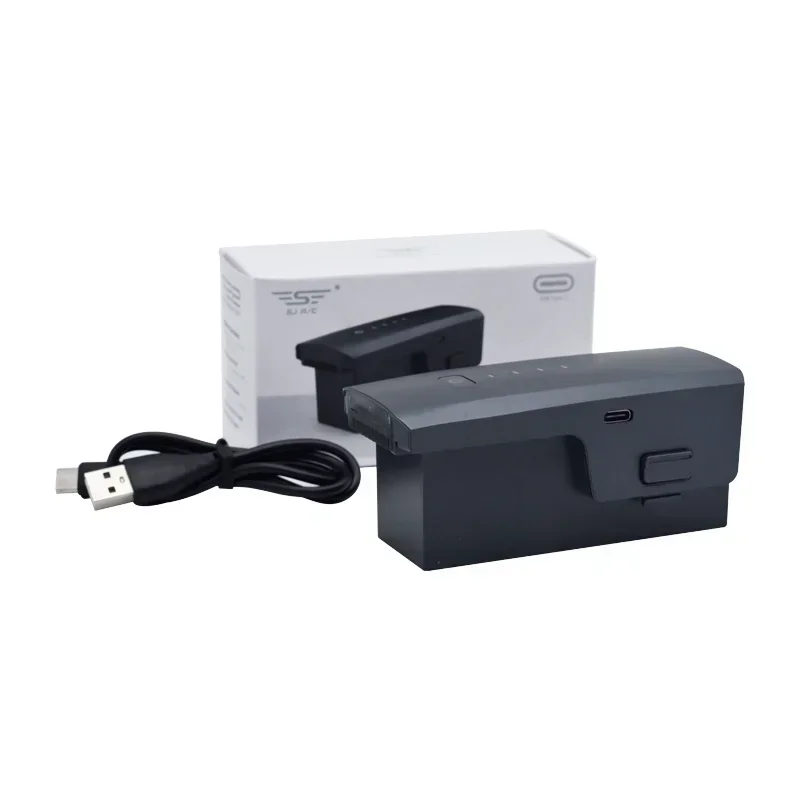 Batterie drone SJRC F22 F22S 4K Pro 3500mAh 11.1V posée à côté d'un drone, autonomie 35 min