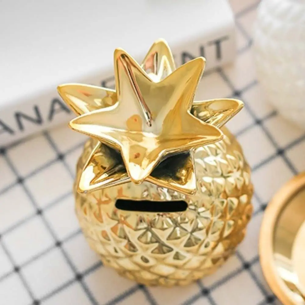 Tirelire ananas en céramique dorée objet décoratif et épargne_voghion.com