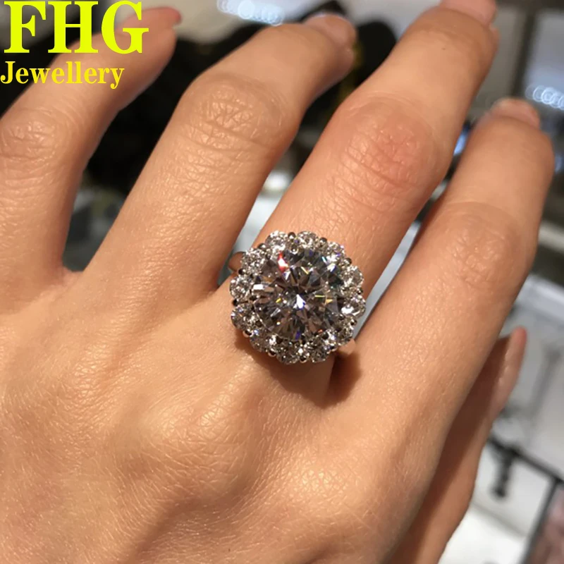 

Кольцо с муассанитом и бриллиантом круглой формы из золота 14 к Au585