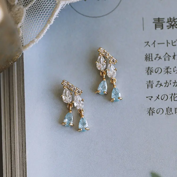 Silver Inlaid White Crystal Faceted Drop-shaped Tassel Earrings