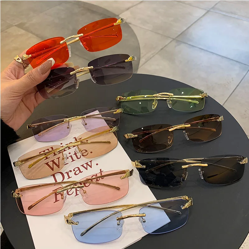 Stylish rimless rectangle sunglasses with tinted lenses and gold temples