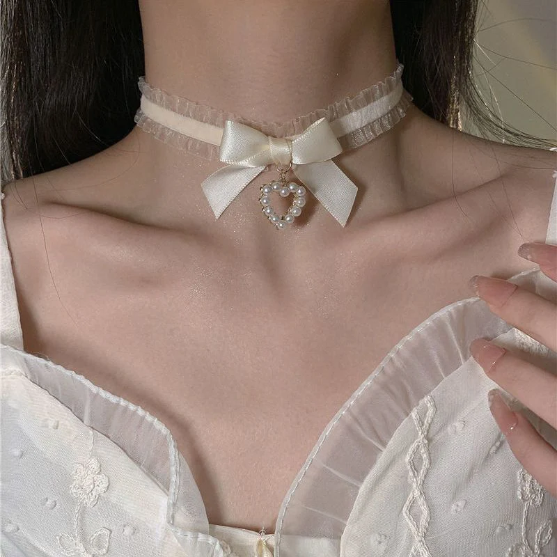 Nuovo grazioso collare Lolita fatto a mano in pizzo vintage con cuore per donne Collana con fiocco gotico Accessori per uniformi da ragazza_voghion.com