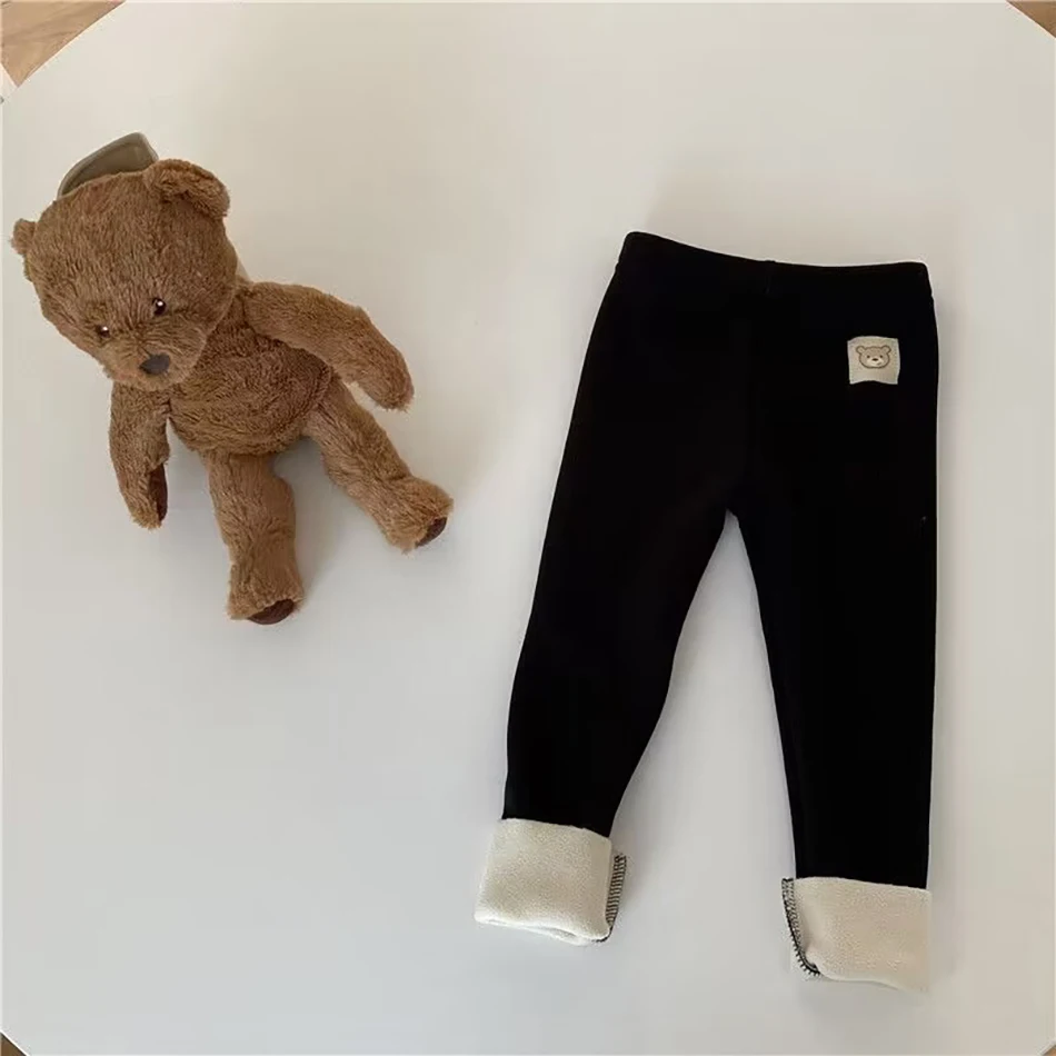 Coreano Otoño Invierno nuevos niños Leggings de una pieza Unisex niños niñas bebé frío evitar caliente dibujos animados elásticos pies atados pantalones - Imagen 2