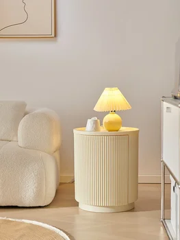 Comodino Nordic Cream Wind Camera da letto di lusso leggera francese Mobili comodini circolari semplici e moderni 1