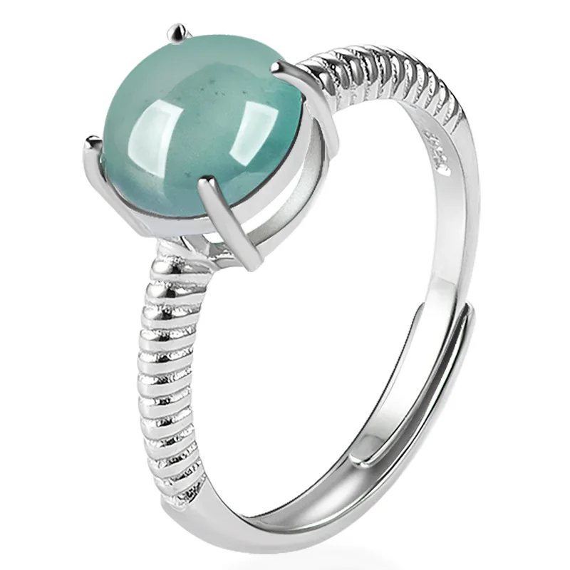 

Кольцо из натурального нефрита с голубым яйцом в форме лица