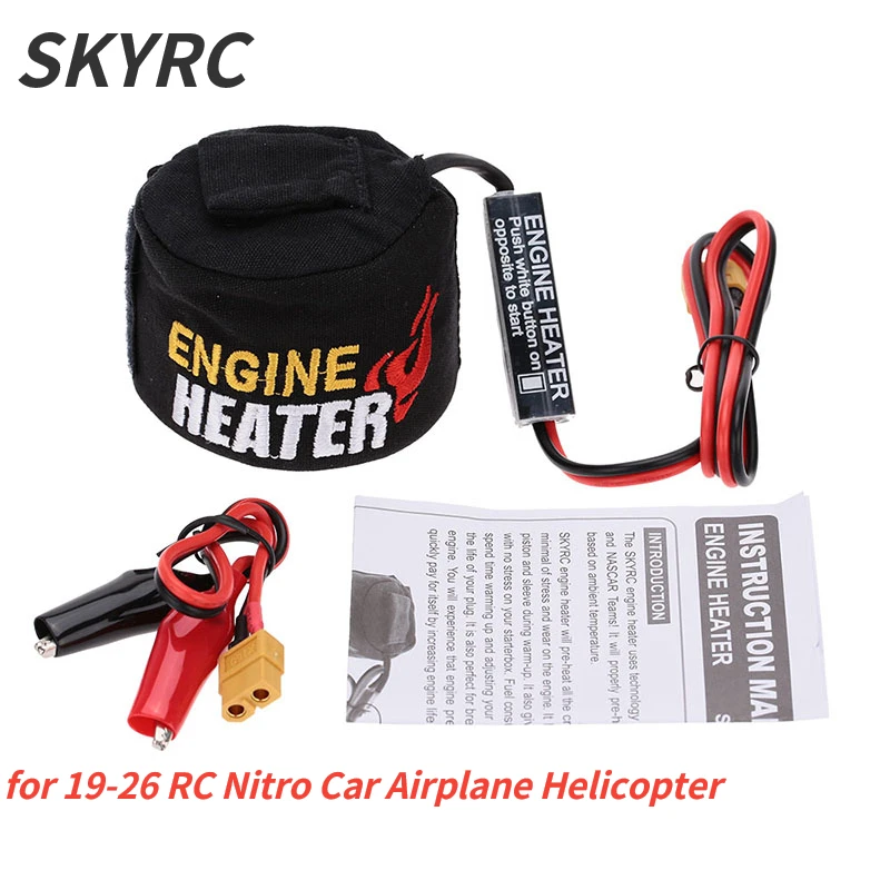Détail de la pince du chauffe-moteur SKYRC Nitro RC fixée sur la bougie d'un moteur RC, préchauffage en cours.