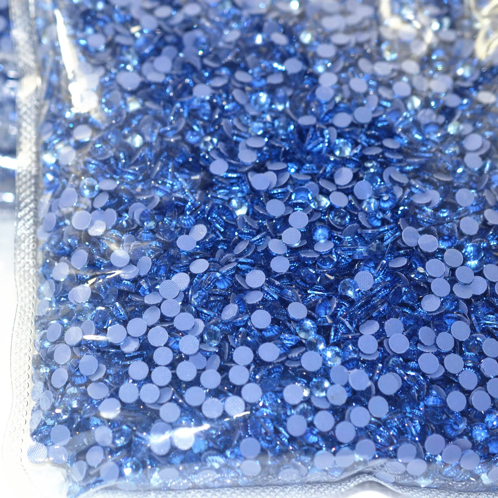 

SS6-SS20 Bulk Package Wholesale High Quality Sapphire Blue Crystal Glass Strass Iron On Hotfix Rhinestones