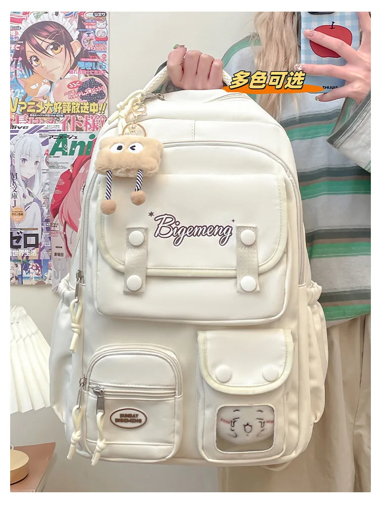 حقيبة ظهر جديدة لعام 2025 لطلاب المدارس الثانوية والمدرسة الابتدائية حقيبة ظهر مدرسية متعددة الاستخدامات مع دمية