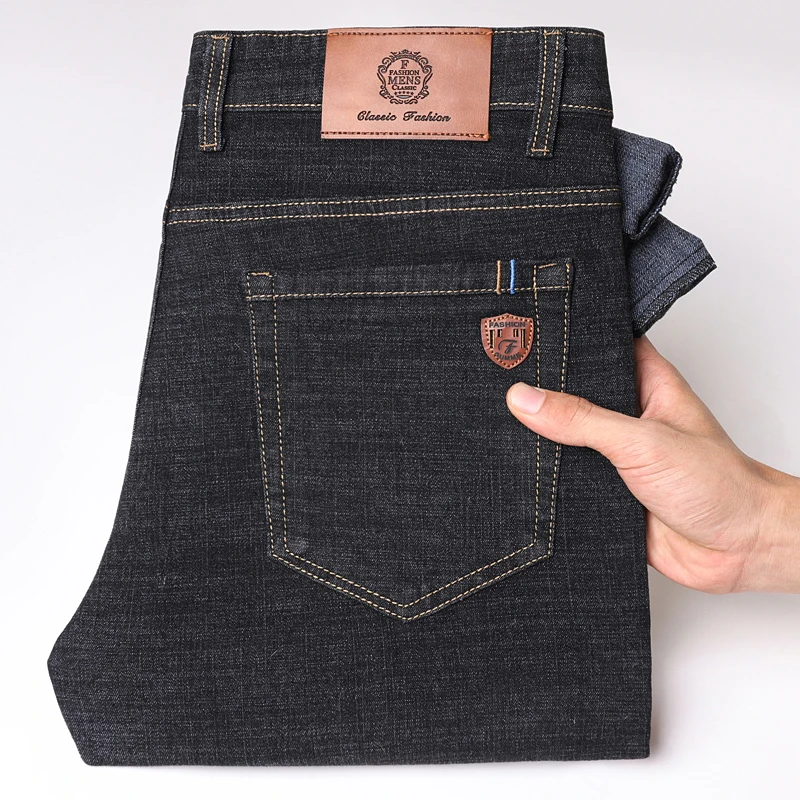 جينز رجال الأعمال الجديد لعام 2025 بقصة ضيقة وساق...