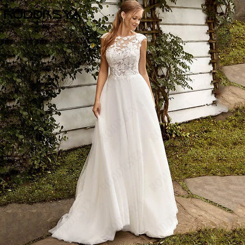 

RODDRSYA Scoop Neck Appliques Vestido De Novia Cap Sleeve Tulle Wedding Dress For Women Backless A-Line Bridal Gowns Custom Made