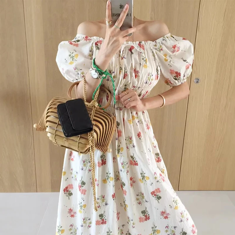 

Clothland Women Sweet Floral Off Shoulder Dress Slash Neck Short Sleeve One Piece White Black Midi Dresses Vestido QD740