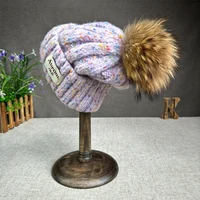 2024 New Fashion Natural fur pompom hat for women High quality mix-Color Travel Beanies Winter Hats for women Warm Female beanie 1