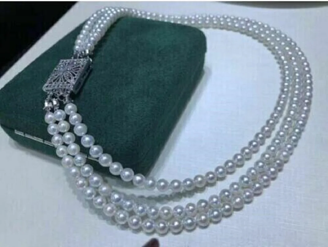 

Three natural AAAA 5-6mm circular akoya white pearl necklace with 18 inch 925S.