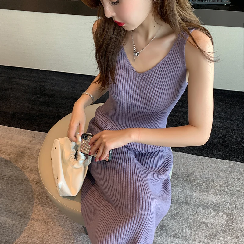 

Spring and autumn knitted slip dresses European and American V-neck vest skirts mid-length slim sexy babes woolen long skirts