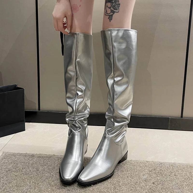 bottes cuir plissées