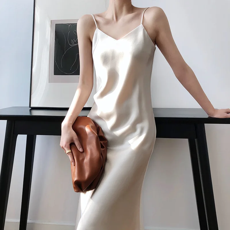 

Silk satin suspender skirt design sense niche 2021 new dress spring and summer A-line inner bottoming long skirt summer