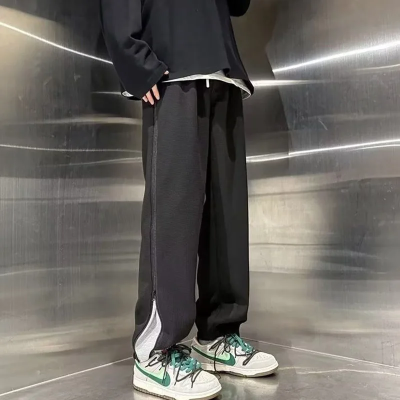 New Spring Checkered Pant Hem Zipper Split Large Size Trendy Travel Luxury Design For Men And Women With Strap Feet Casual Pants