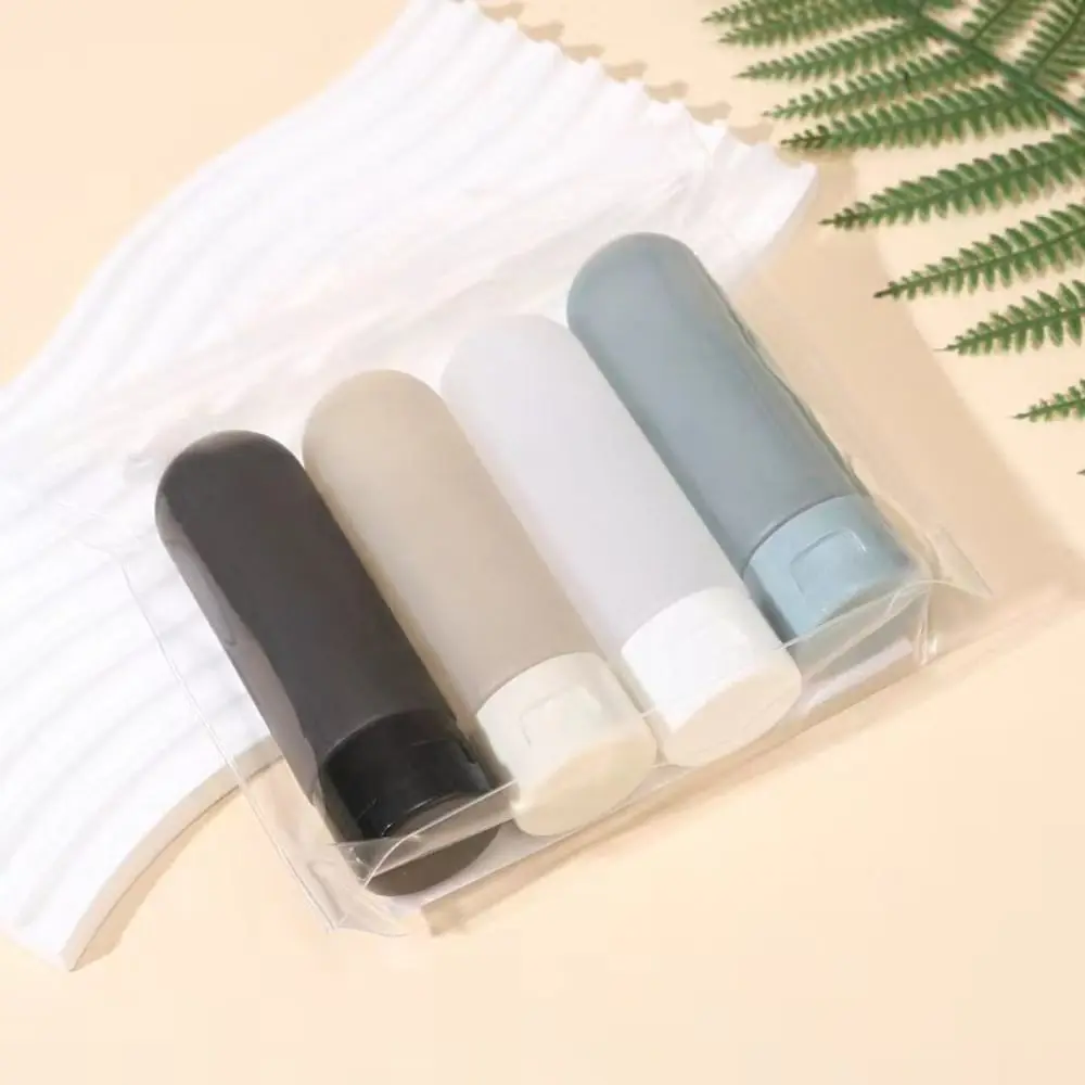 Set of 4 Refillable Silicone Travel Bottles - Leak-Proof, BPA-Free, Portable, Squeezable Containers