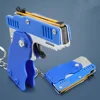 1PC Mini Keychain Gun Rubber Band Gun Toy Gun Shooting Pistol Alloy Kid Outdoor Activities Party Game Birthday Gift for Children 2