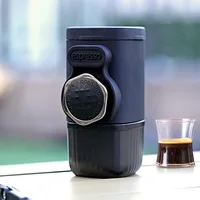 Portable hand-operated coffee machine
