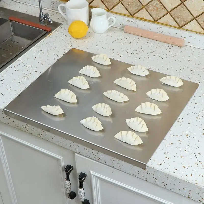 https://ae01.alicdn.com/kf/Sbb234010d3824105b4f11f5ba2990b9da/Anti-slip-Stainless-Steel-Cutting-Board-With-Lip-For-Kitchen-Counter-Dough-Countertop-Protector-Home-Restaurant.jpg